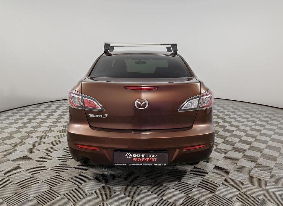Mazda 3, II (BL) Рестайлинг 1.6 AT (105 л.с.)