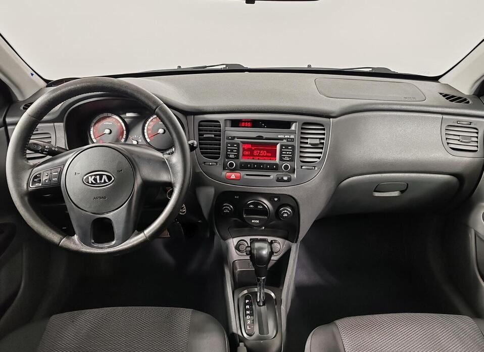 Kia Rio, II Рестайлинг 1.4 AT (95 л.с.)