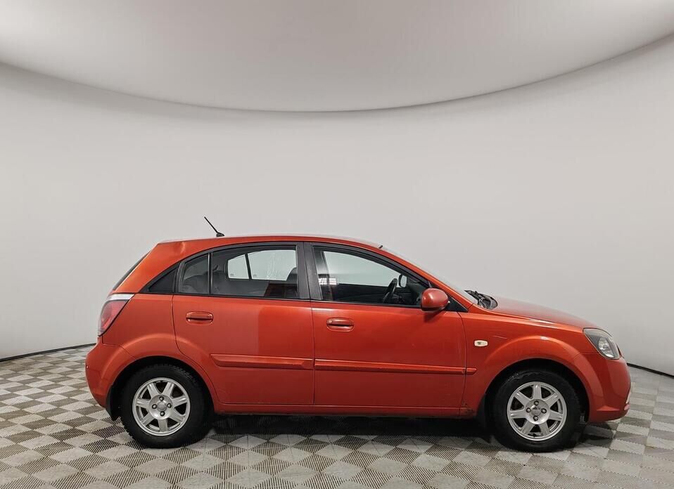 Kia Rio, II Рестайлинг 1.4 AT (95 л.с.)