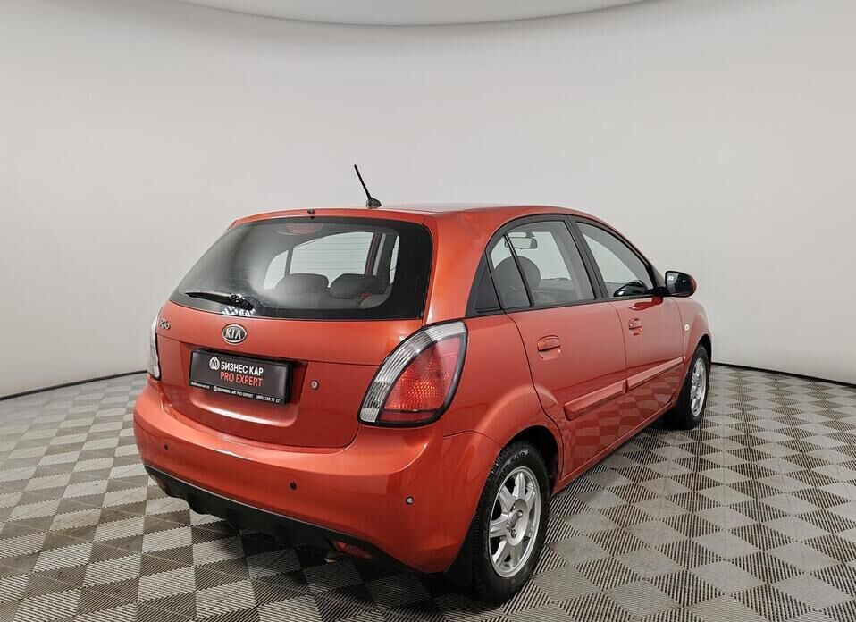 Kia Rio, II Рестайлинг 1.4 AT (95 л.с.)