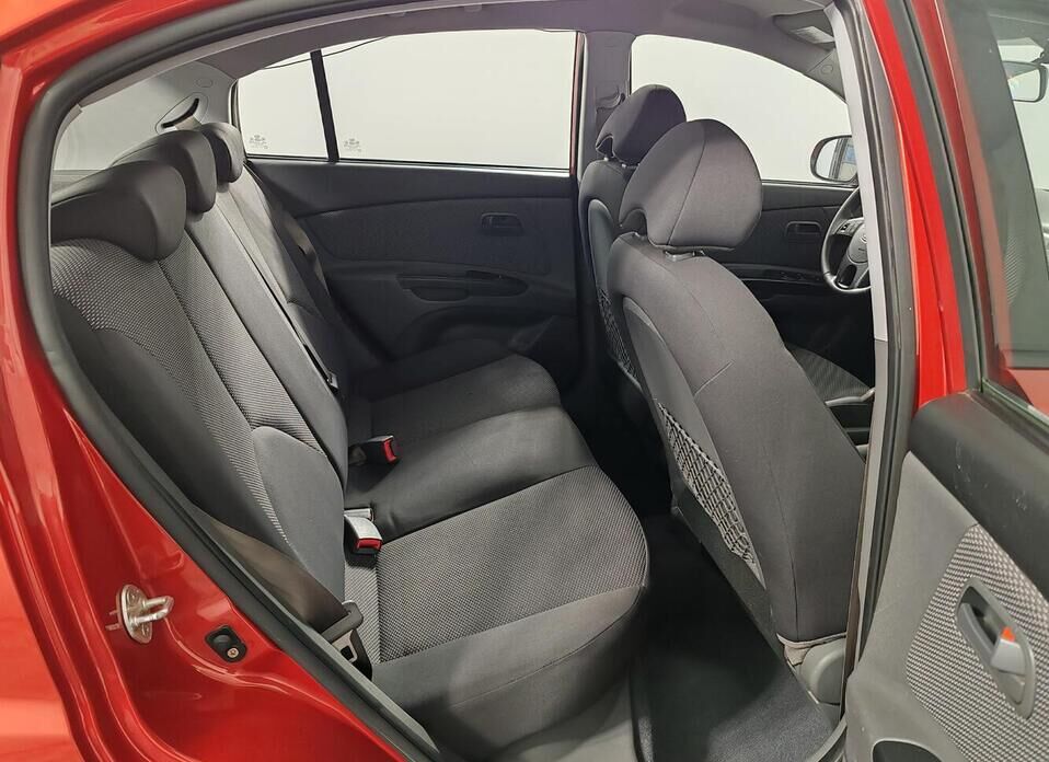 Kia Rio, II Рестайлинг 1.4 AT (95 л.с.)