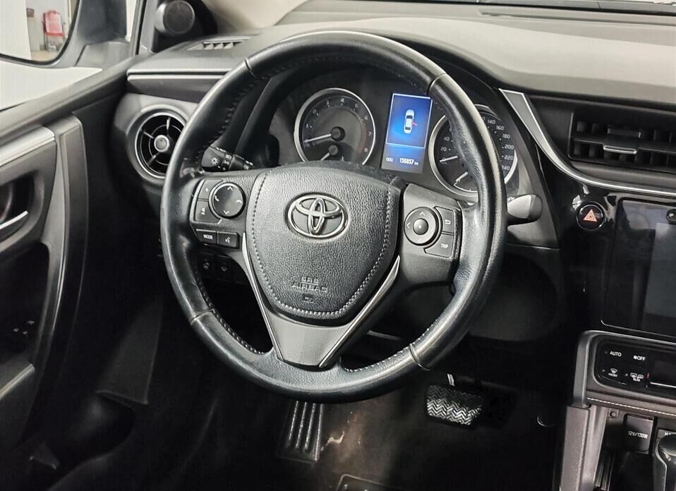 Toyota Corolla, XI (E160, E170) Рестайлинг 1.6 CVT (122 л.с.)