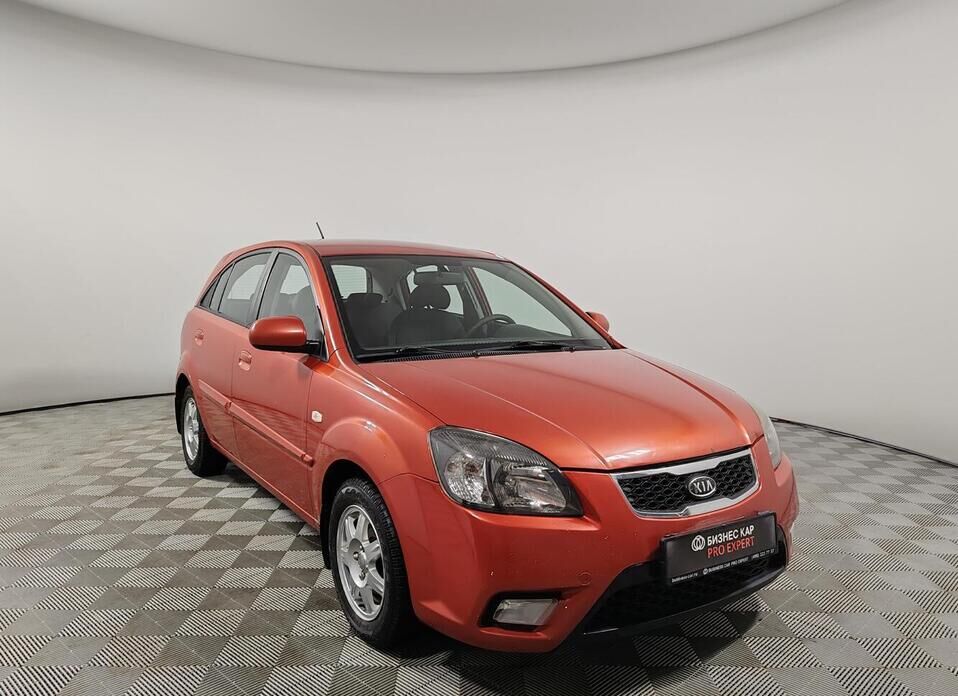 Kia Rio, II Рестайлинг 1.4 AT (95 л.с.)