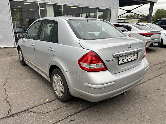 Nissan Tiida, 2010 г., 216 634 км