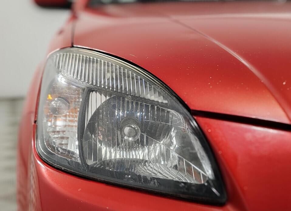 Kia Rio, II Рестайлинг 1.4 AT (95 л.с.)