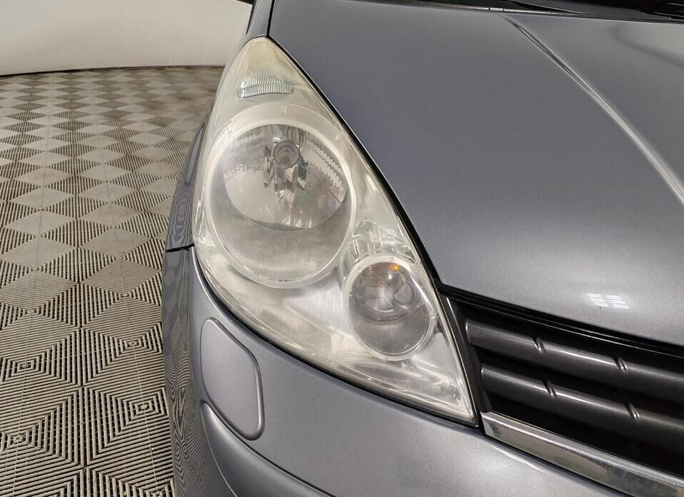 Nissan Note, I Рестайлинг 1.4 MT (88 л.с.)
