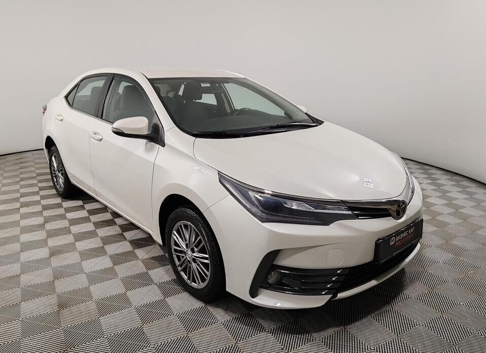 Toyota Corolla, XI (E160, E170) Рестайлинг 1.6 CVT (122 л.с.)